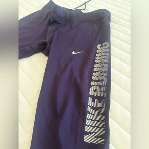 Nike Purple Leggings with White Swoosh and Side Script